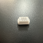 高精度網格霧化芯（Mesh Coil）結構特寫，展現其微細發熱網格與高導油棉的精密結合，這是定義口感層次與還原度的核心技術。